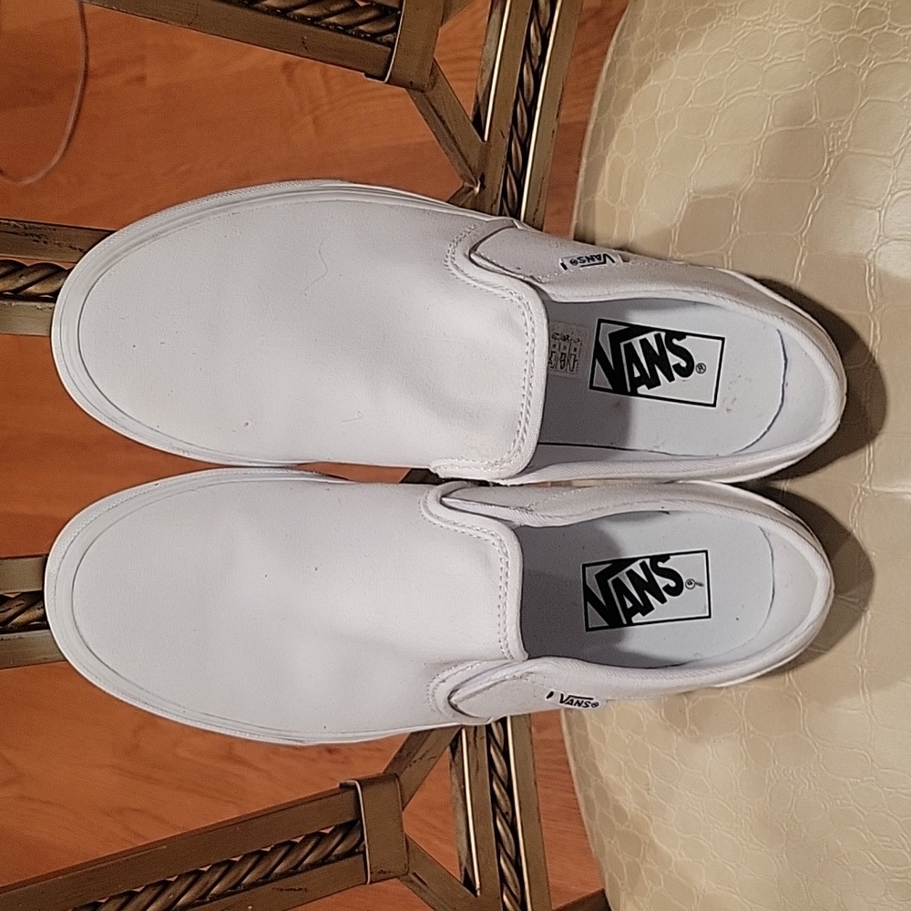 New but no box. Vans White Slip-On Women’s Size 9. Retail $60